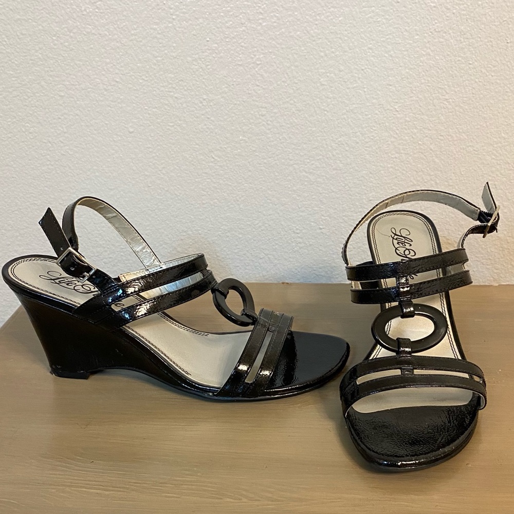NWOT Black wedge heel. Size 8.5